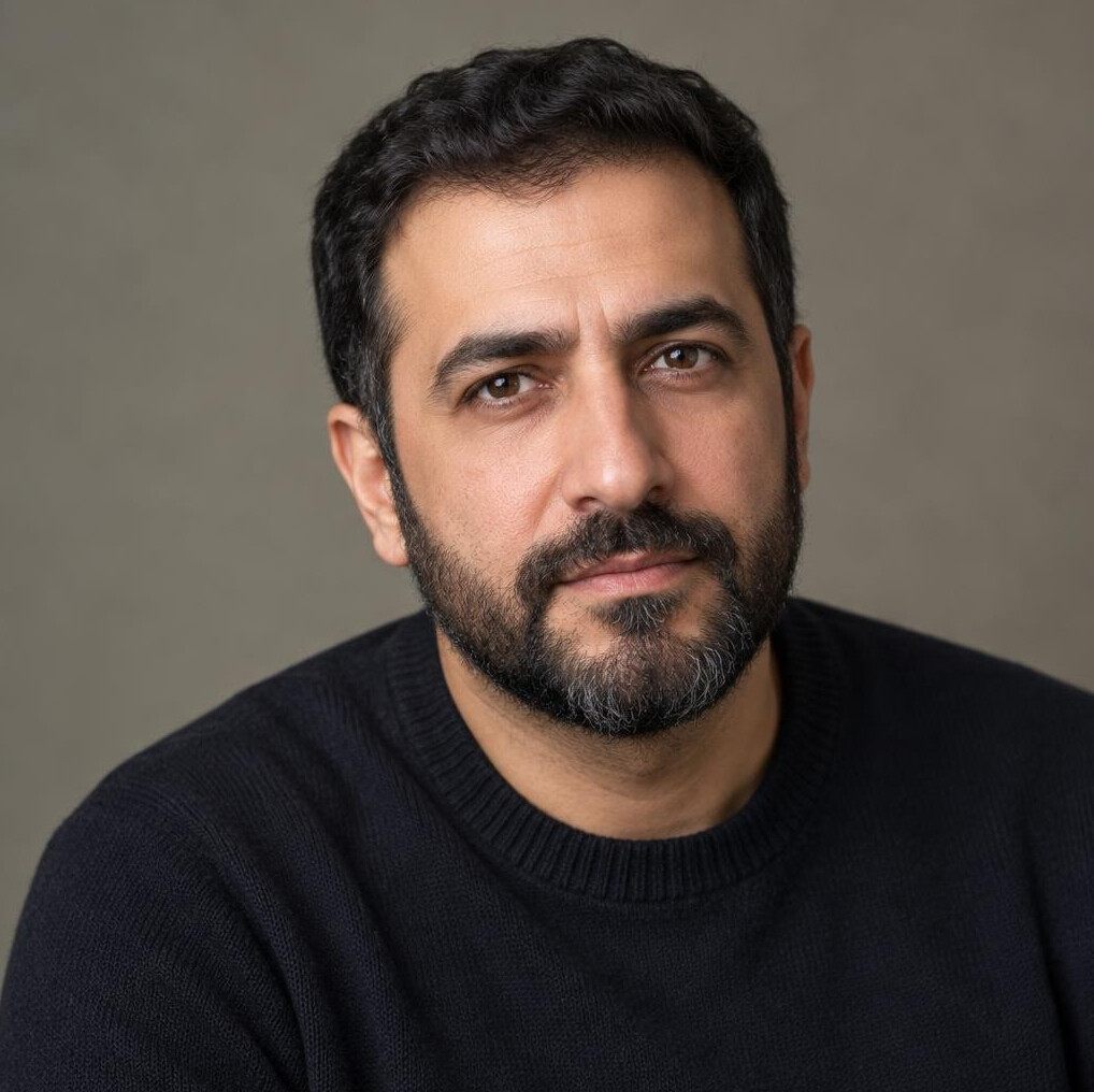 Studio portrait of a man of Middle Eastern descent in his forties
